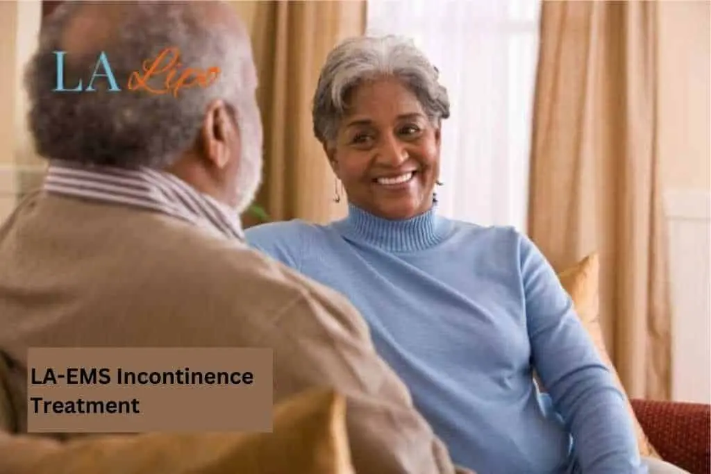 Couple sat smiling at each other - LA-EMS treatment Clifton